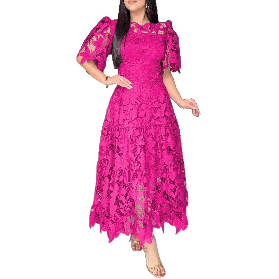 Women's maxi dress made of floral guipure lace with a fitted silhouette and tiered hem Mune Fashion