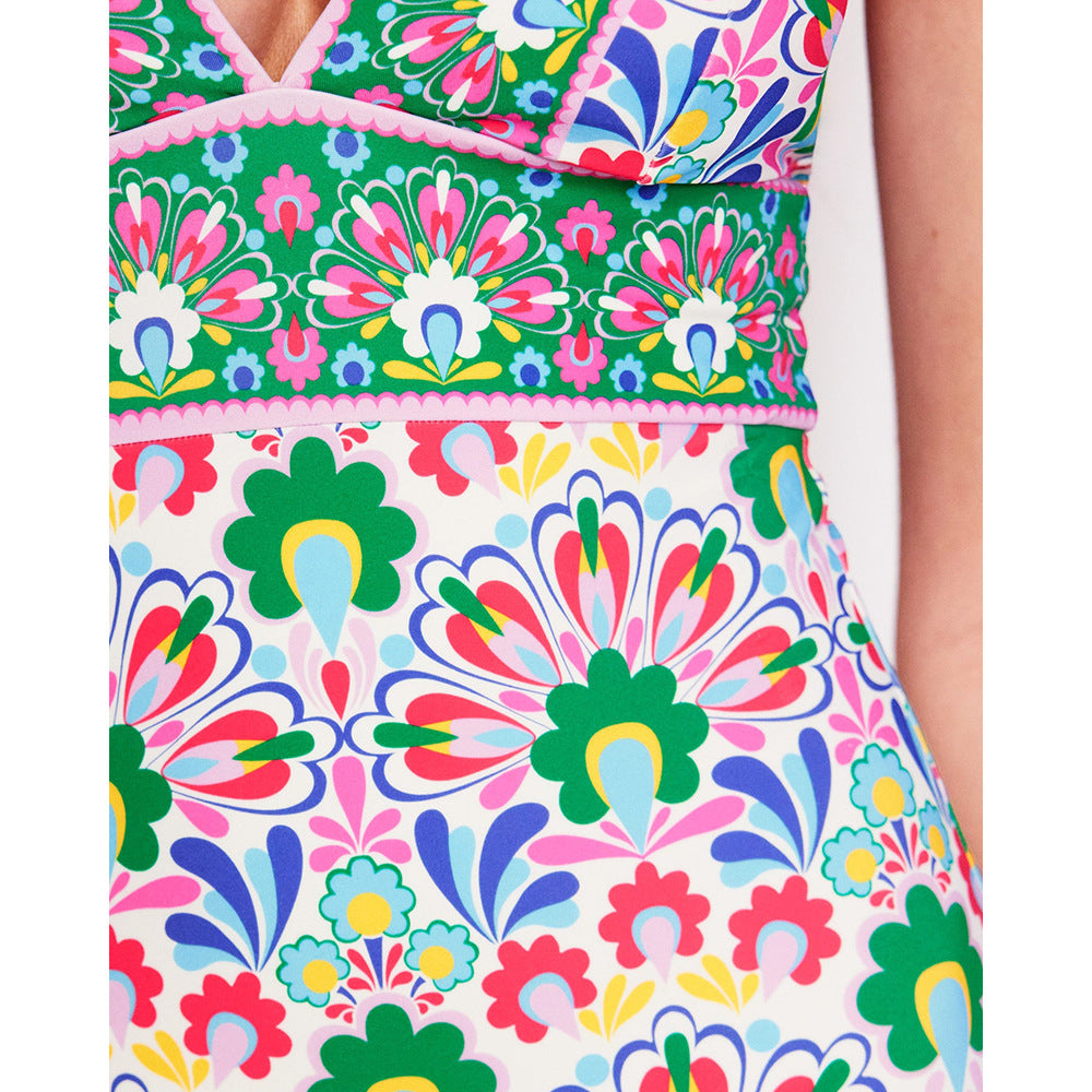 Women's swimsuit with continuous floral pattern and matching wrap skirt Mune Fashion
