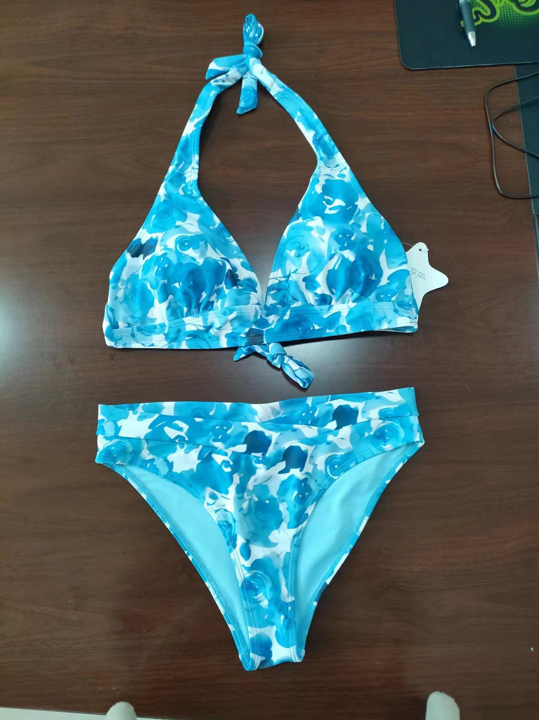 Women’s triangle bikini set with adjustable straps and floral pattern Mune Fashion