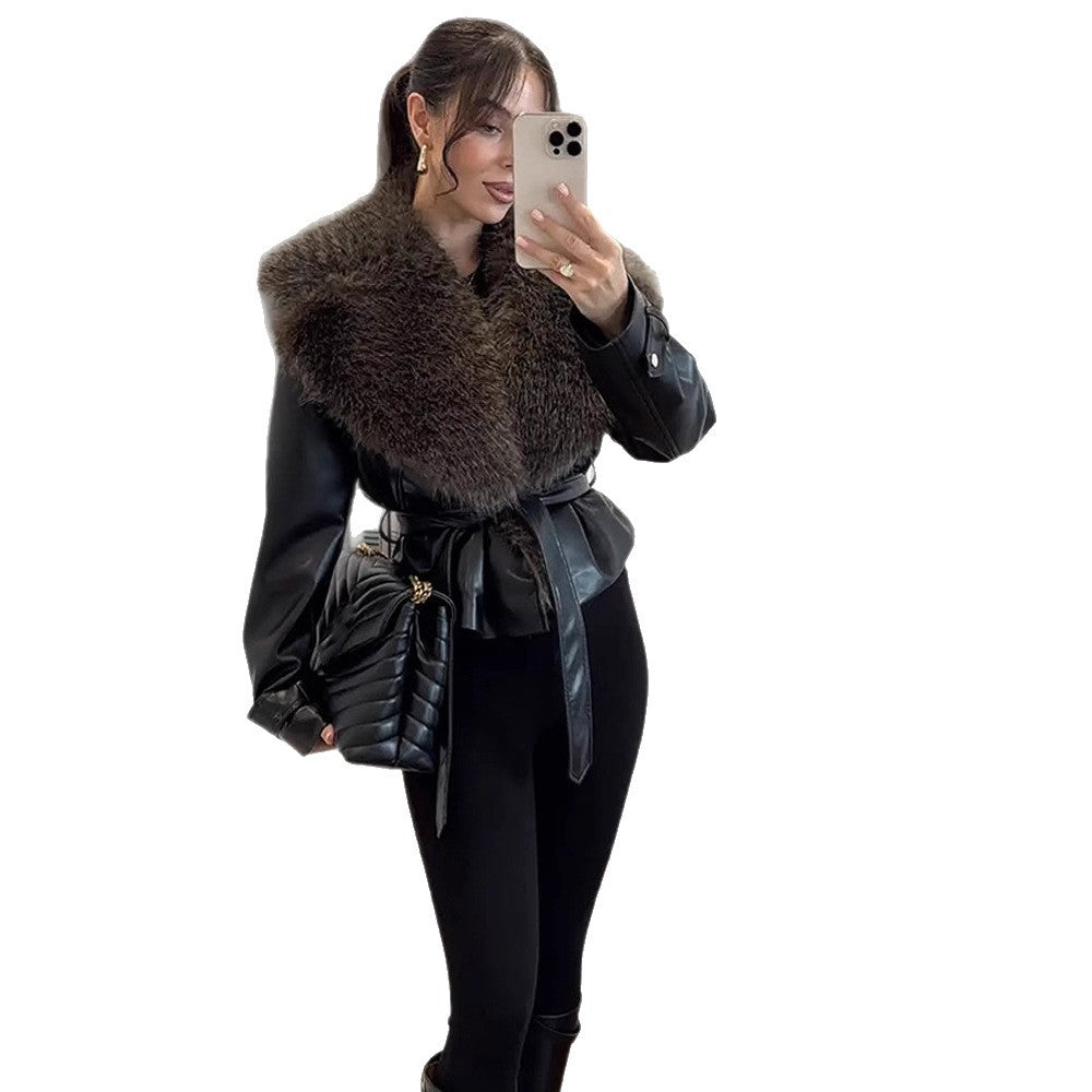Women's tailored faux leather jacket with voluminous faux fur shawl collar and tie belt Mune Fashion