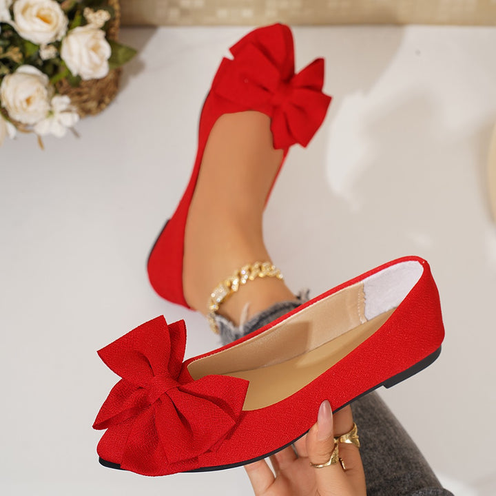 Ladies elegant lace ballerinas with large decorative bow and shimmering upper material Mune Fashion