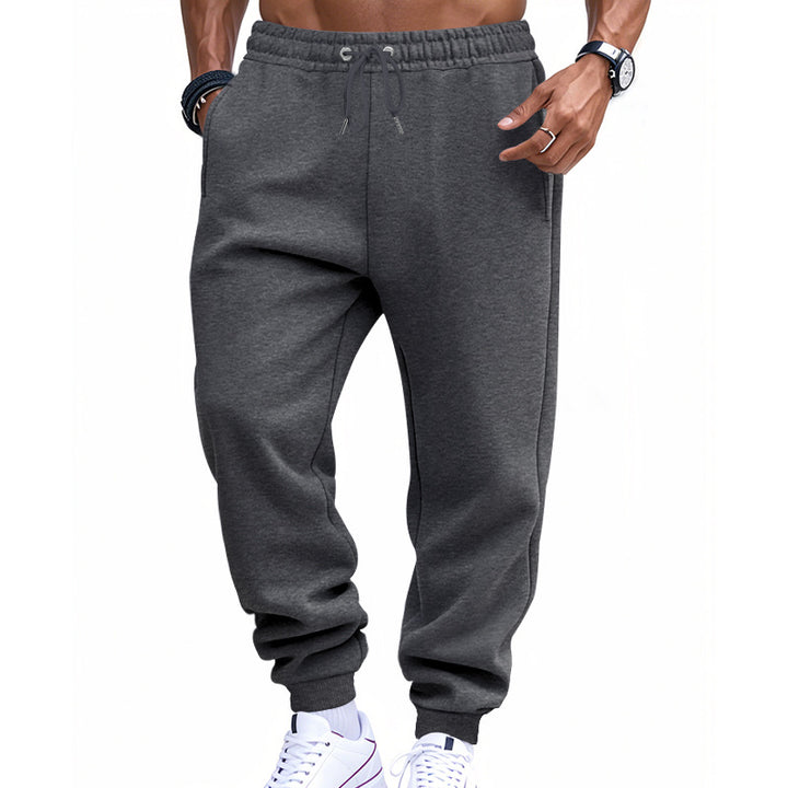Men's sporty sweat jogging pants with elastic tunnel drawstring waist, ribbed cuffs, and deep side pockets Mune Fashion