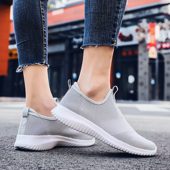 Women's minimalist slip-on leisure shoe with front pull tab, padded ankle collar, and flexible adaptive sole Mune Fashion