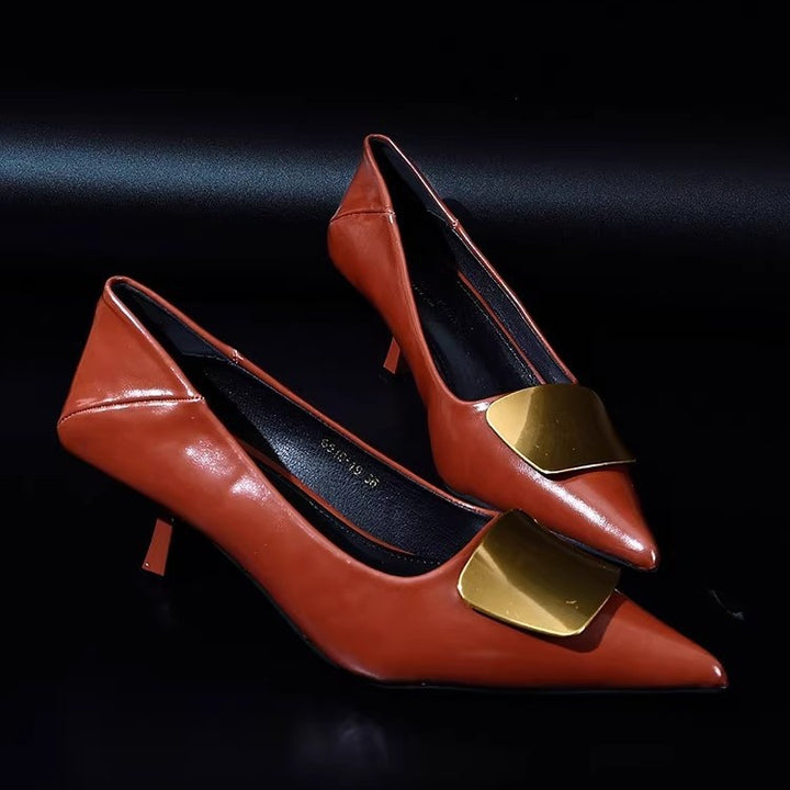 Women's pointed patent pumps with low kitten heel and decorative metal application Mune Fashion