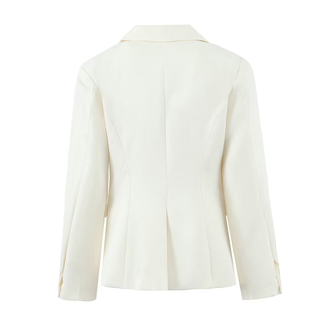 Women's tailored single-breasted blazer with princess seams, flap pockets, and decorative buttons Mune Fashion