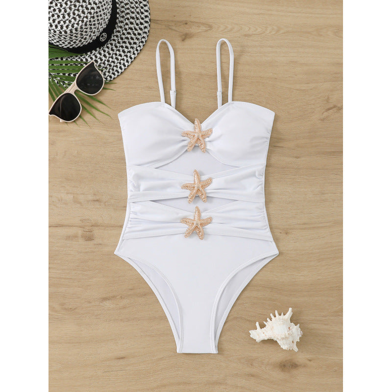 Women's elegant swimsuit with unique neckline and glittering star appliqués Mune Fashion