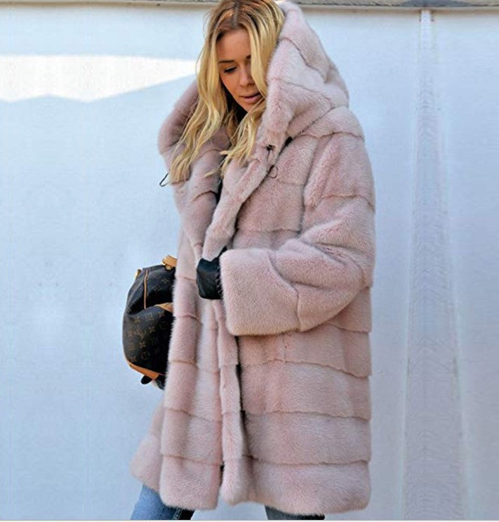Women's oversized faux fur coat with hood and quilted panel design Mune Fashion