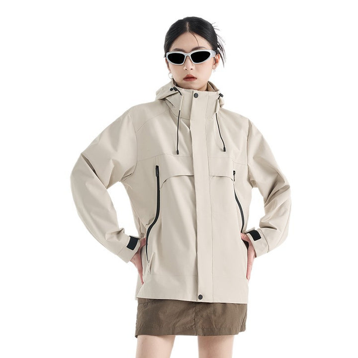 Women's technical waterproof oversized parka with hood and concealed zip pockets Mune Fashion