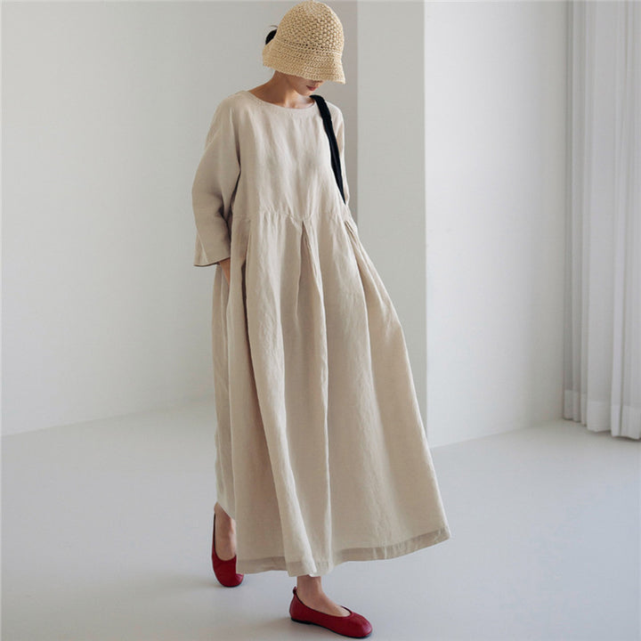 Women’s maxi dress made of linen with partial seam, gentle drape and long sleeves Mune Fashion