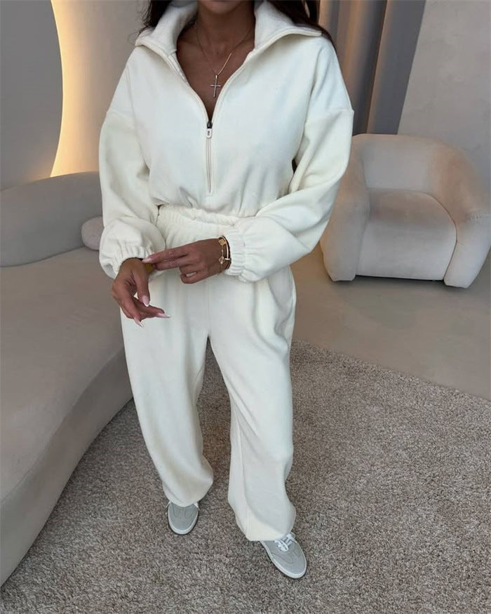 Women's elegant lounge overall with elastic waistband, stand collar, zipper and wide leg.