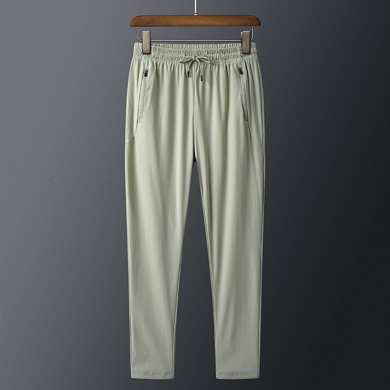 Men's sporty training pants with practical zip pockets Mune Fashion
