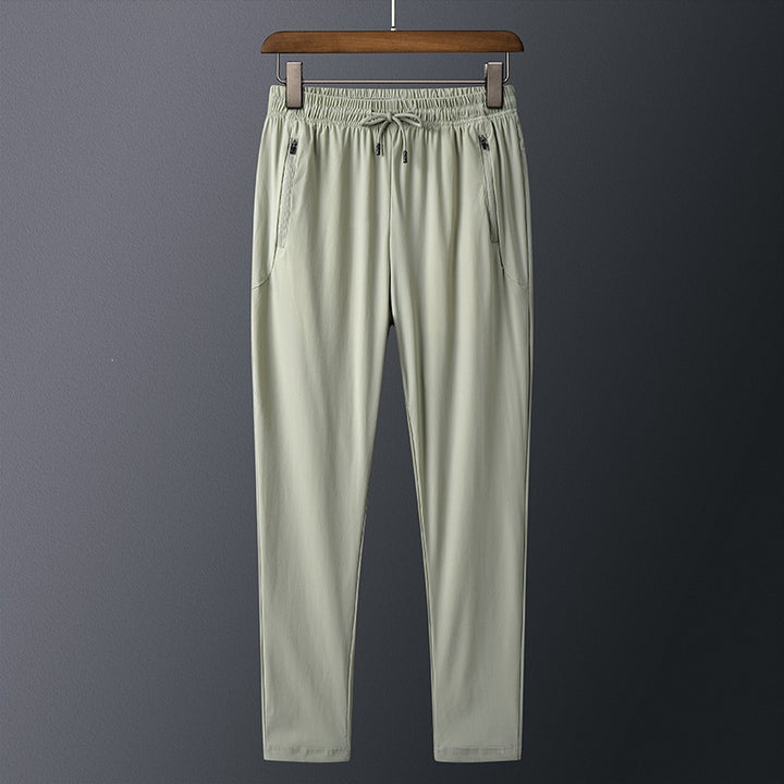 Men's sporty training pants with practical zip pockets Mune Fashion