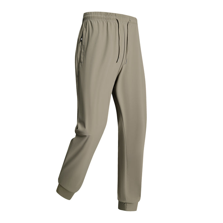 Men's sporty training pants with elastic waistband and zippered pockets Mune Fashion