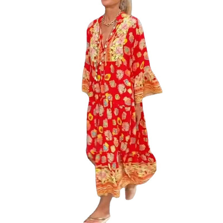 Women's airy kaftan midi dress with folk-inspired border print, V-neckline, tassel ties, and flounce bell sleeves Mune Fashion