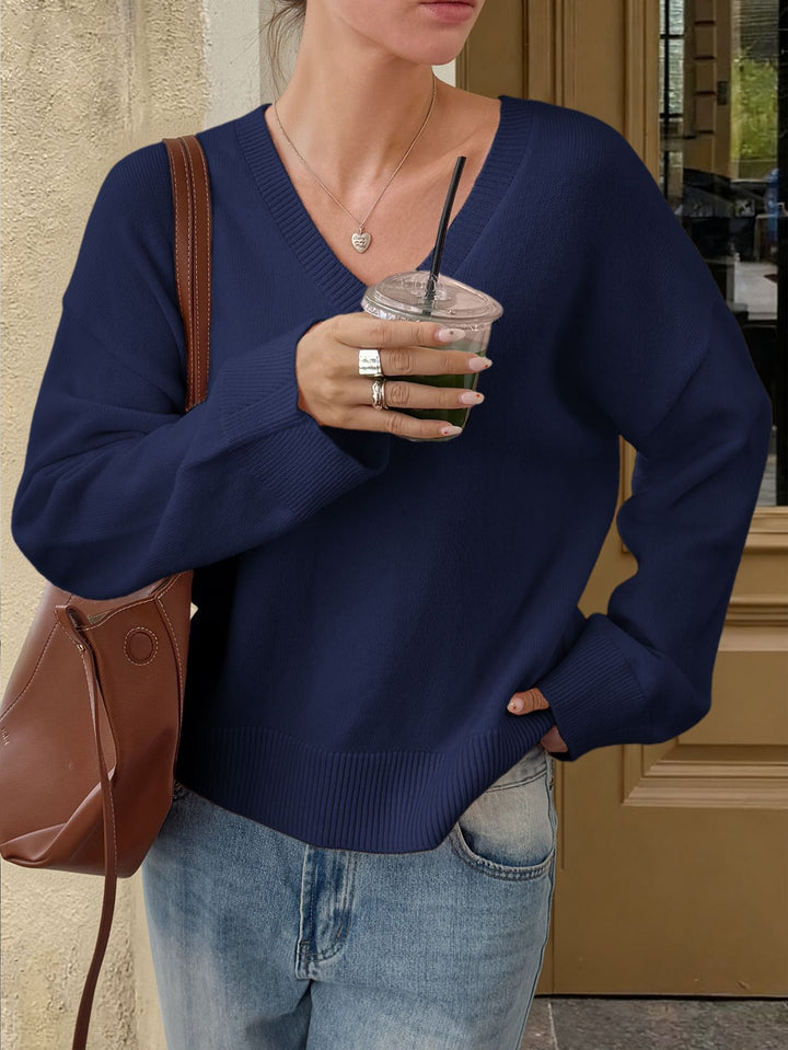 Women's oversized V-neck fine knit sweater with dropped shoulder, long kimono sleeves and wide ribbed trim Mune Fashion