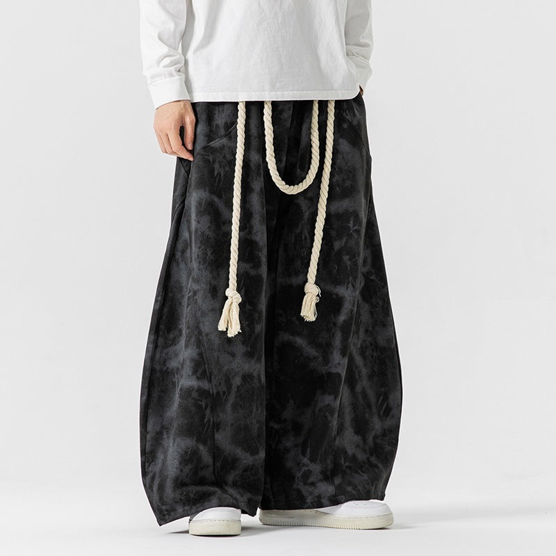 Unisex wide batik harem pants with decorative drawstring and deep crotch Mune Fashion