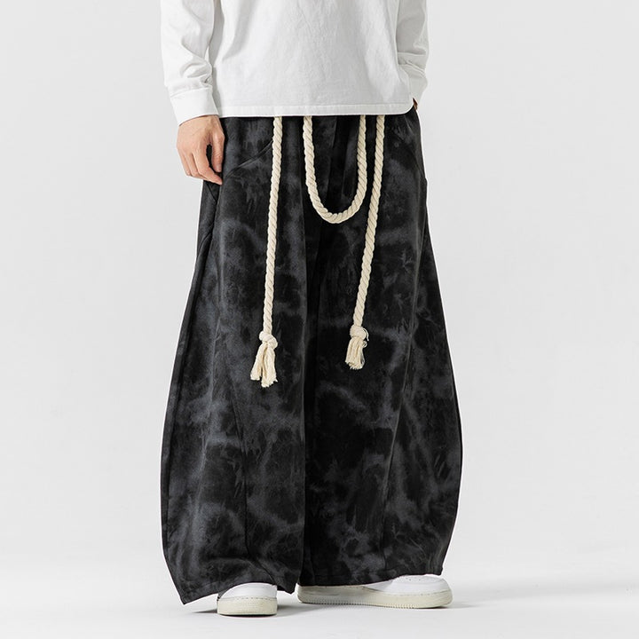 Unisex wide batik harem pants with decorative drawstring and deep crotch Mune Fashion