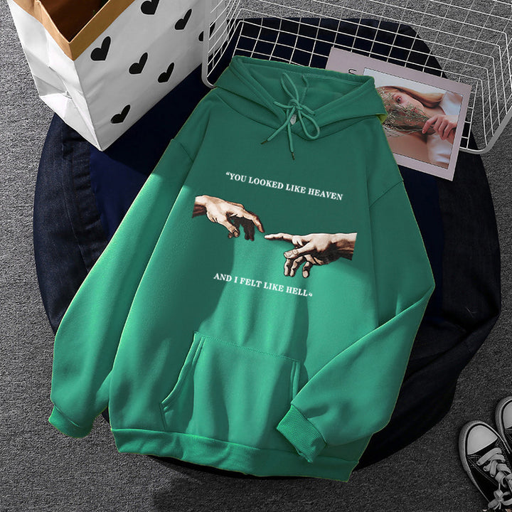 Women's oversized hoodie with kangaroo pocket and Renaissance hand design, soft fleece lining Mune Fashion