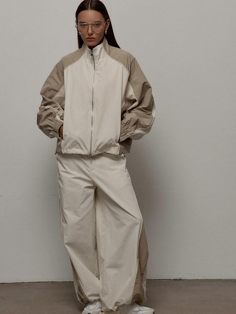 Women's oversized sporty track jacket with high stand-up collar and raglan sleeves Mune Fashion