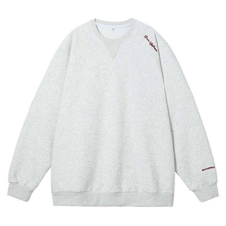Unisex Boxy Sweatshirt made of mélange French terry with raglan sleeves and subtle script embroidery Mune Fashion