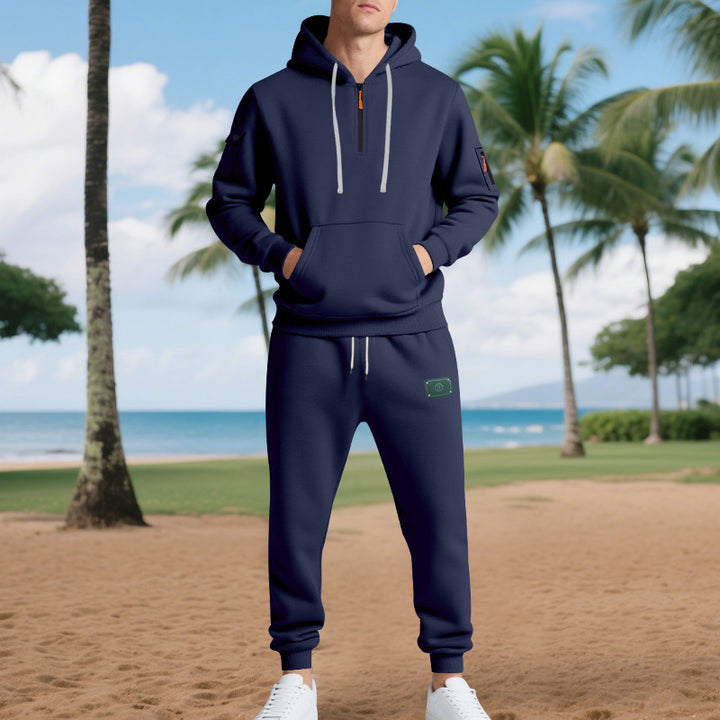 Men's half-zip hoodie and tapered jogger set with kangaroo pocket, zipper details, and elastic drawstring waistband Mune Fashion