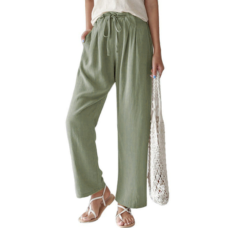 Ladies casual linen pants with wide legs, elastic waistband and side pockets Mune Fashion