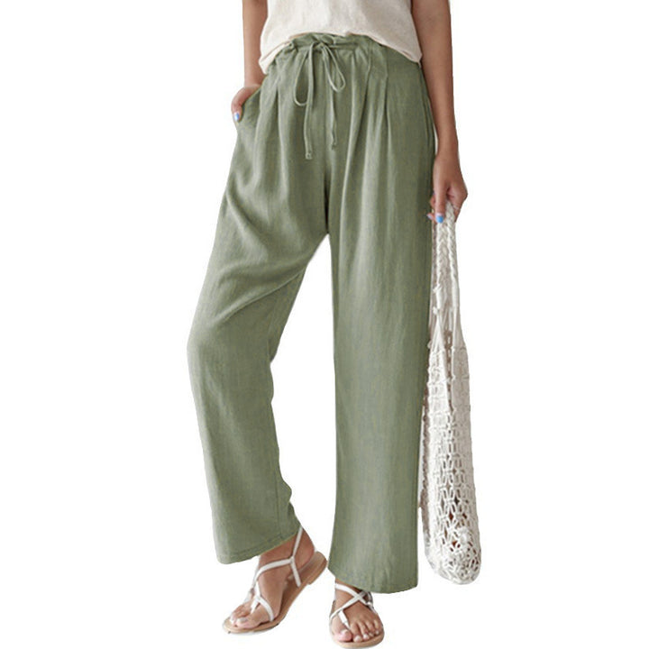 Ladies casual linen pants with wide legs, elastic waistband and side pockets Mune Fashion