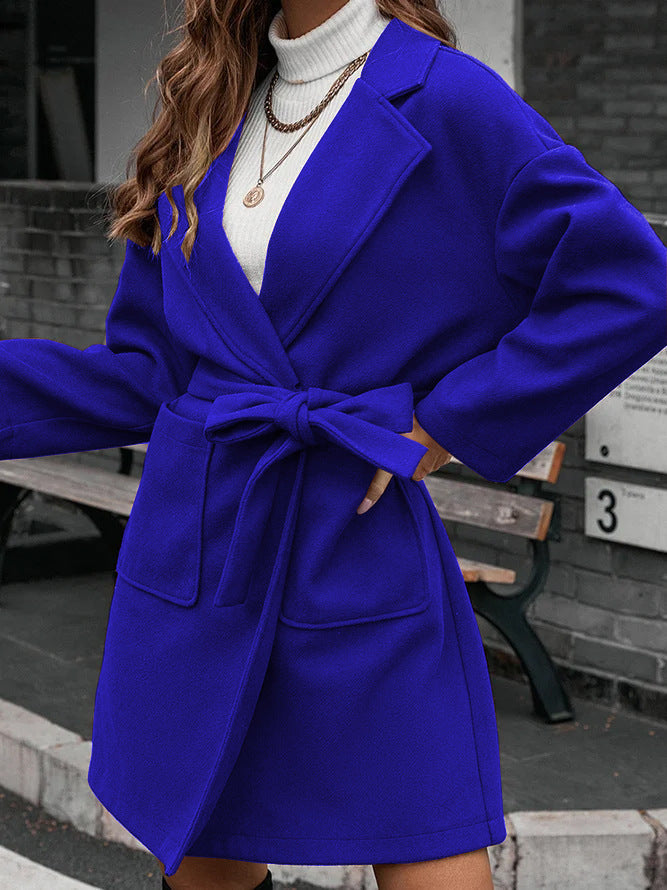 Ladies wrap coat with tie belt, large flap pocket and lapel collar Mune Fashion