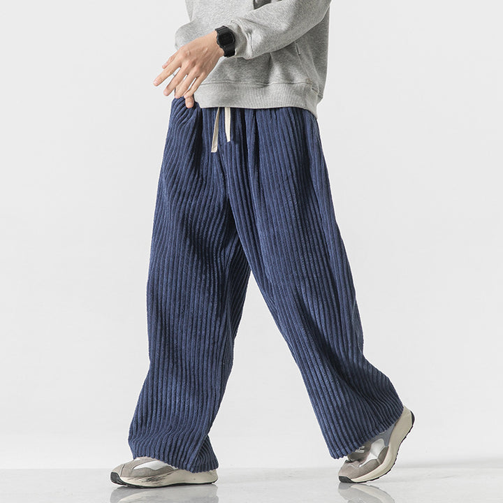 Men's loosely cut corduroy pants with drawstring waistband and distinctive ribbed texture Mune Fashion