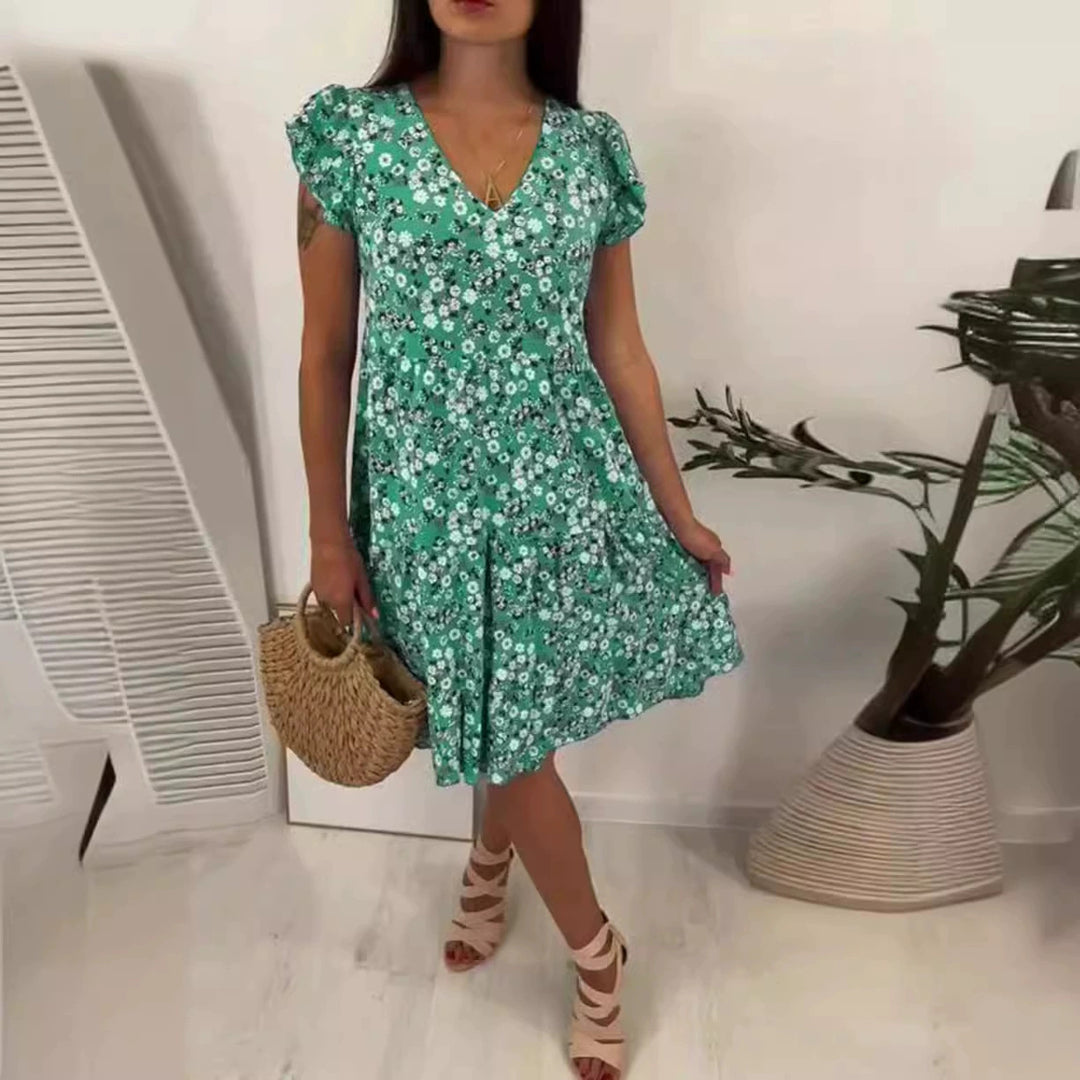 Women’s V-neck dress with gathered waist seam, short flounce sleeves, and tiered skirt Mune Fashion