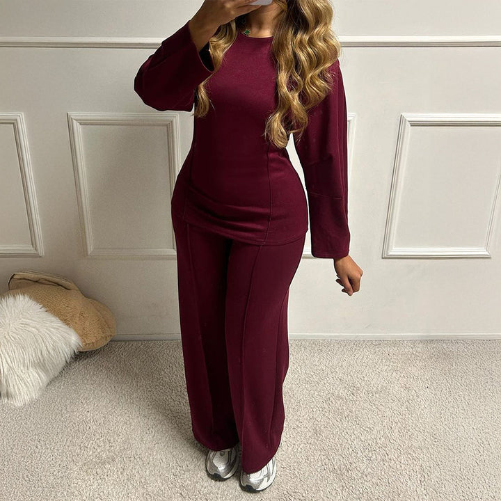 Women's soft lounge set with fitted sweatshirt, sculpting seam details, and wide palazzo pants leg Mune Fashion