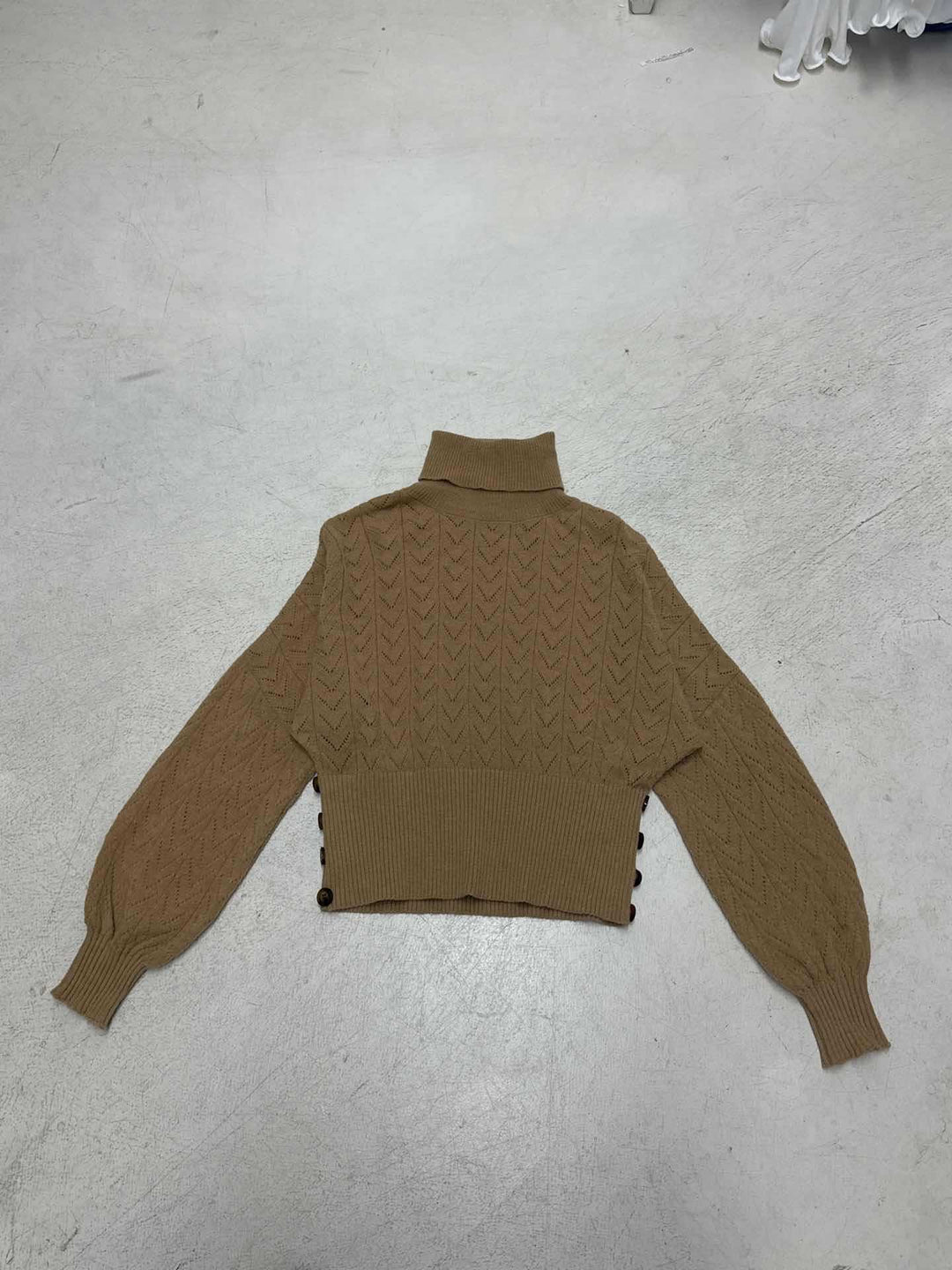 Women's short knit turtleneck with decorative button placket and balloon sleeves Mune Fashion