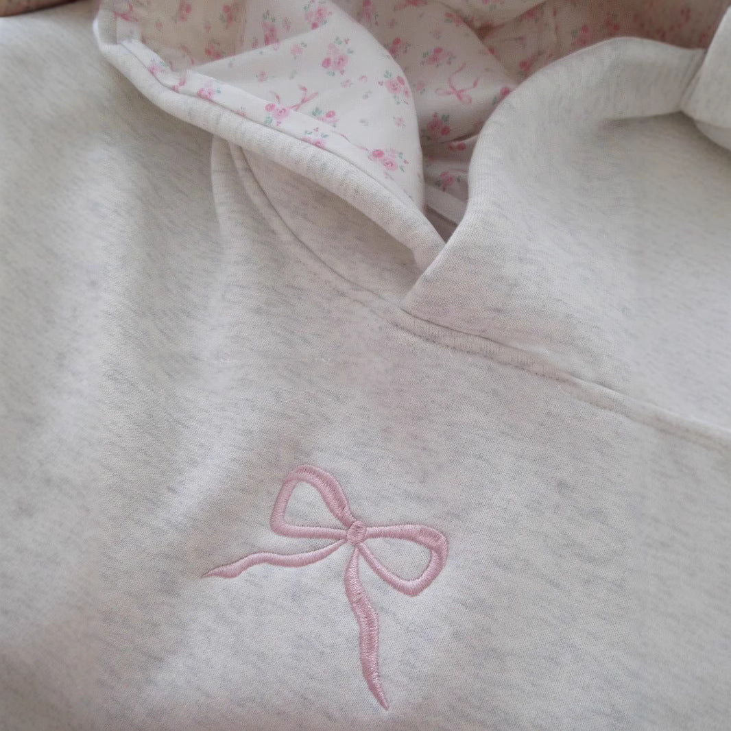 Women's hoodie with floral embroidery design and printed hood lining Mune Fashion