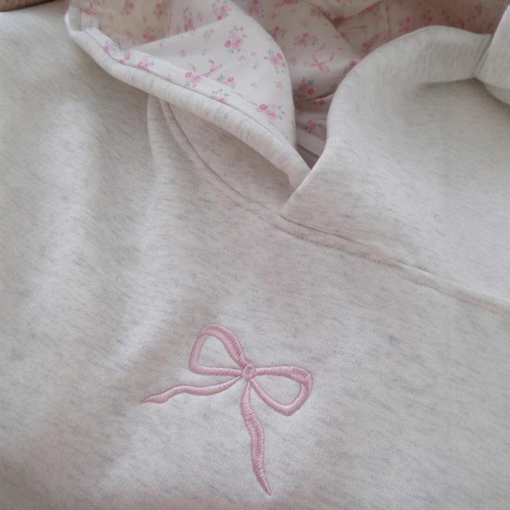 Women's hoodie with floral embroidery design and printed hood lining Mune Fashion