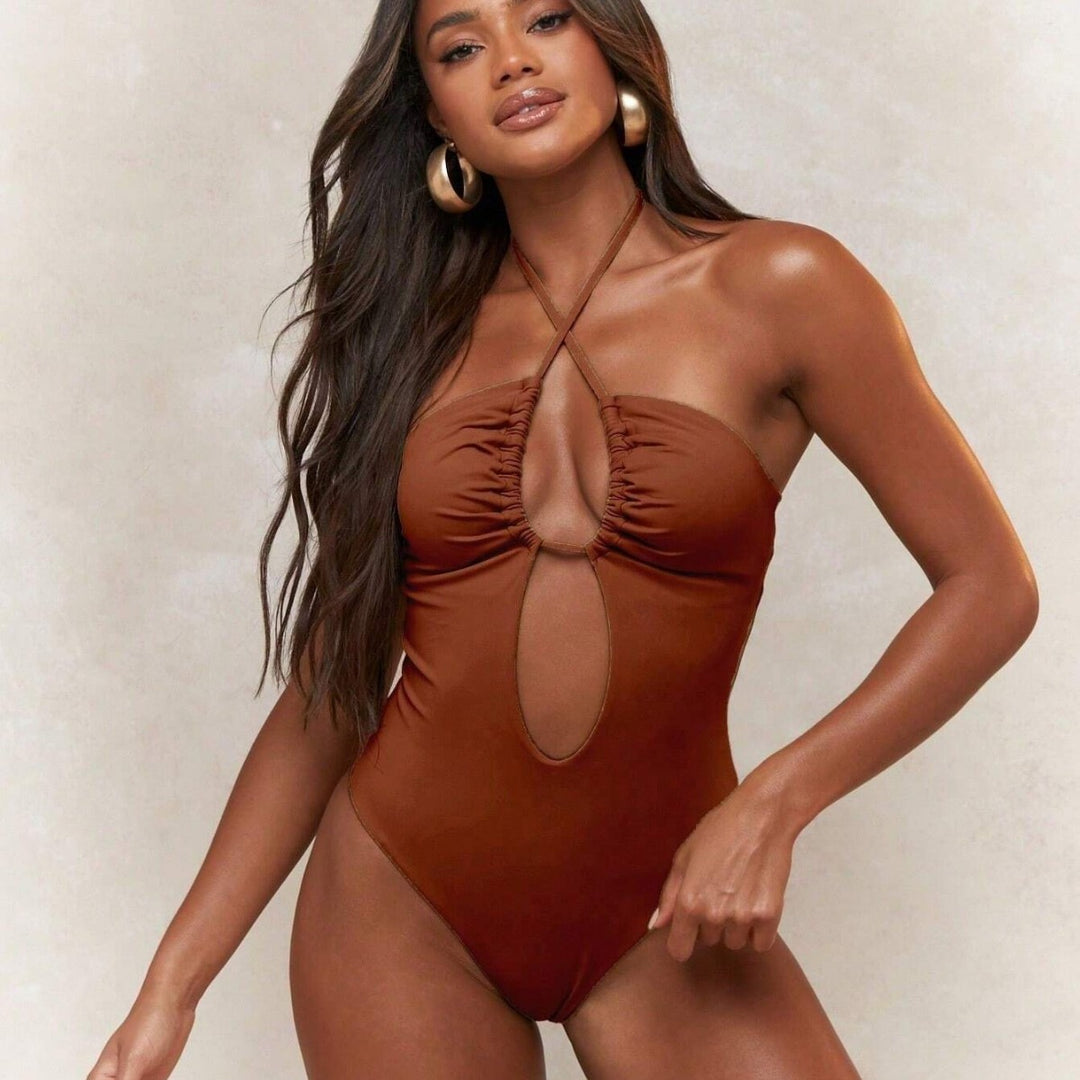 Ladies Trendy One-Piece Swimsuit with Playful Cut-Out Mune Fashion