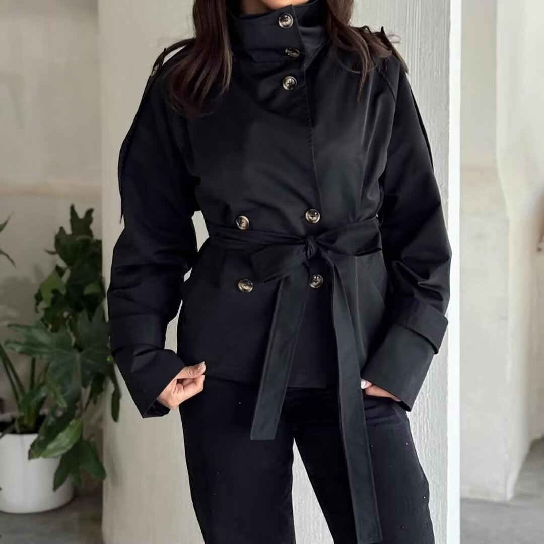 Ladies short jacket in navy-inspired double-breasted design with stand-up collar, decorative buttons, and tie belt Mune Fashion