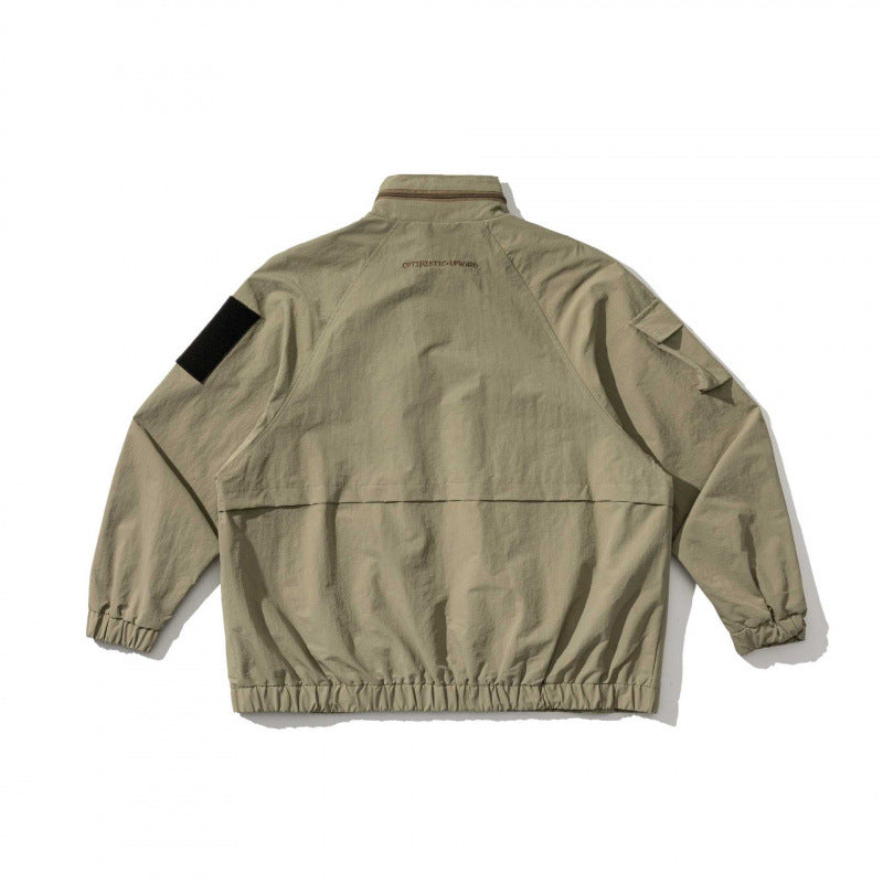 Unisex Oversize Utility Jacket with multifunctional pockets, high stand-up collar, and elastic hem Mune Fashion