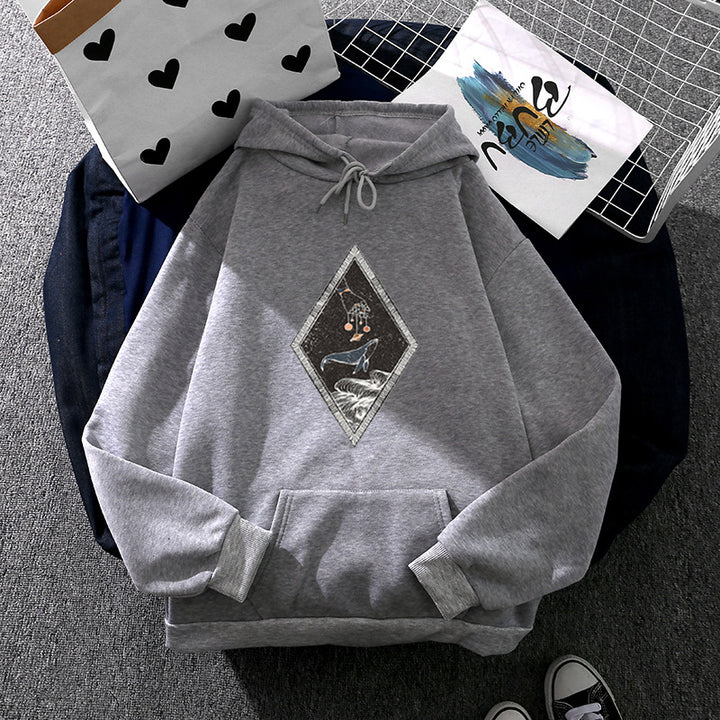 Women's oversized hoodie with sewn whale patch application, kangaroo pocket, and fleece-lined interior Mune Fashion