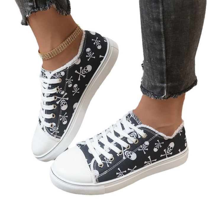 Women’s casual platform sneaker with skull print, frayed canvas trim and reinforced toe cap Mune Fashion