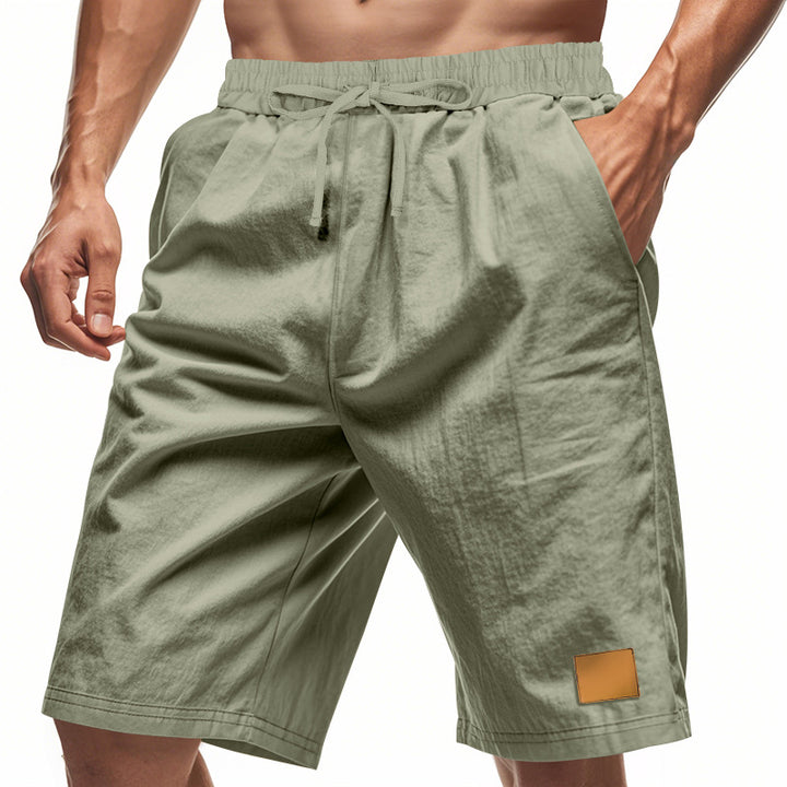 Men's drawstring Bermuda shorts made of soft cotton blend with elastic waistband and side pockets Mune Fashion