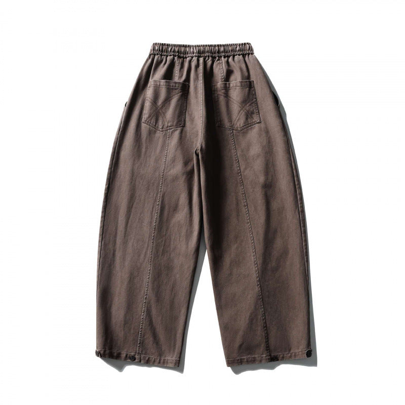 Unisex wide balloon pants made of cotton blend with drawstring waistband and decorative darts Mune Fashion