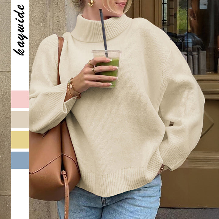 Women's oversized turtleneck sweater with wide ribbed collar, voluminous balloon sleeves, and extended cuffs Mune Fashion
