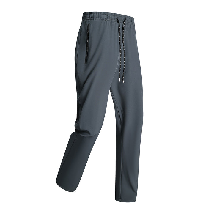 Men's sporty training pants with elastic waistband and zippered pockets Mune Fashion