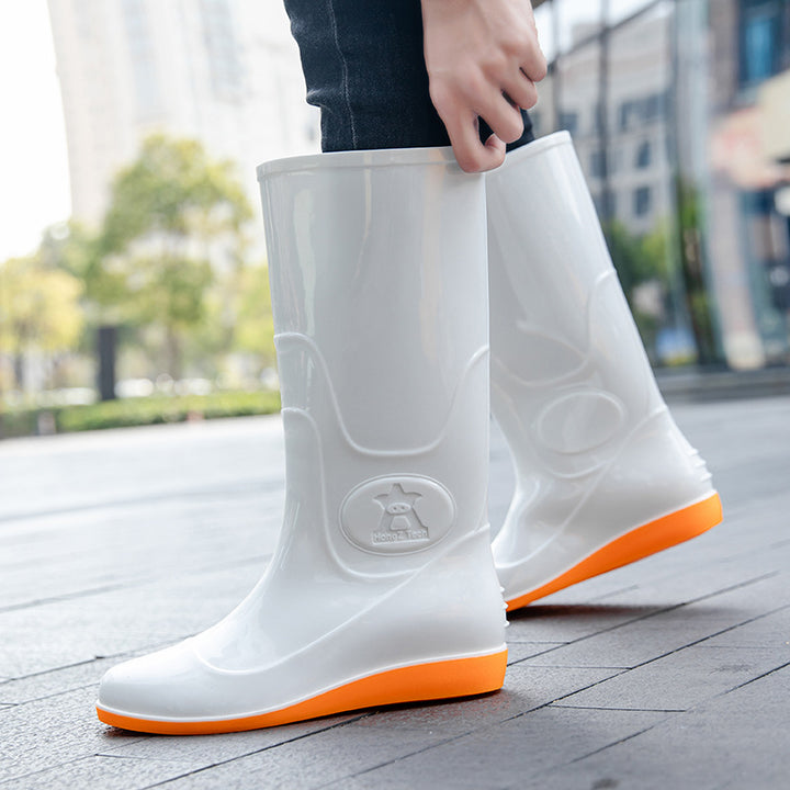 Women Shiny mid-height rain boots made of PVC with a lightweight wedge heel Mune Fashion