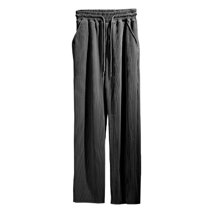 Men's loosely cut pleated trousers with drawstring and wide leg Mune Fashion