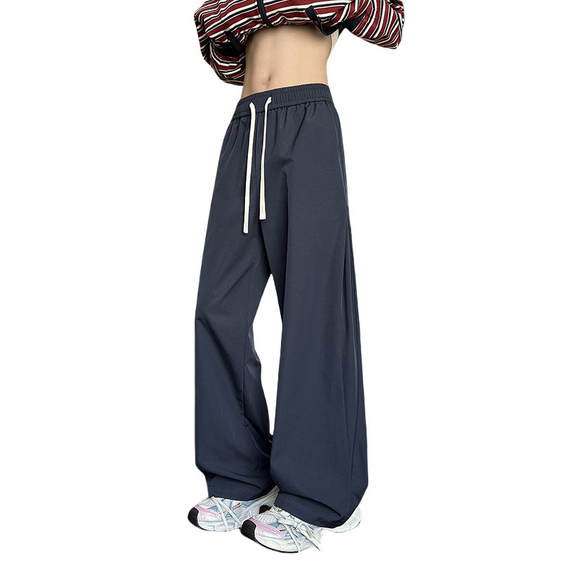 Women's wide-cut lounge pants with high elastic waistband and drawstring Mune Fashion