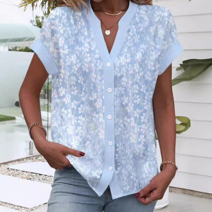 Women's airy button blouse with V-neck, rolled sleeves and floral textured print Mune Fashion