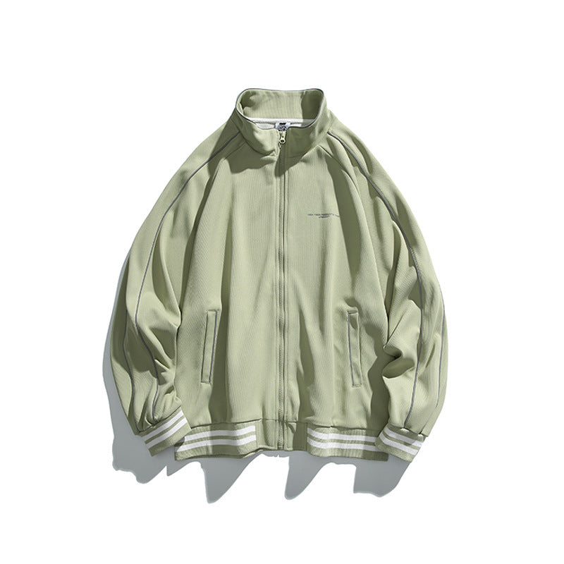 Unisex Sportive Track Jacket in oversized cut with stand-up collar, contrast piping and ribbed cuffs Mune Fashion