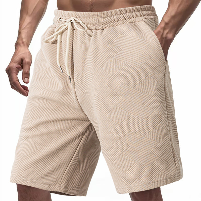 Men's knee-length textured swim shorts with elastic drawstring waistband and side pockets Mune Fashion