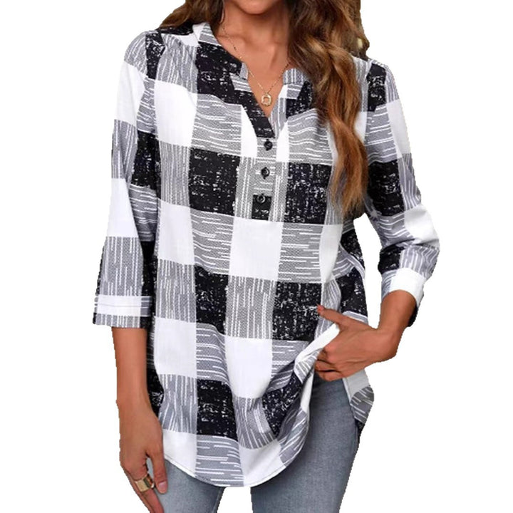 Women’s loose checkered tunic blouse with half button closure and rounded hem Mune Fashion